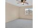 Cozy bedroom with a ceiling fan and bright window at 3457 Abilene Gold Ct, Las Vegas, NV 89129