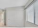 Bedroom features large closet doors and window with blinds for natural light at 3457 Abilene Gold Ct, Las Vegas, NV 89129