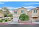 Inviting two-story home with a charming front yard and an attached one car garage at 3457 Abilene Gold Ct, Las Vegas, NV 89129