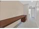 Hallway with built-in desk area and drawers, leading to other rooms at 3457 Abilene Gold Ct, Las Vegas, NV 89129