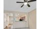 Bright living room area with view to kitchen that has wood cabinets and modern appliances at 3457 Abilene Gold Ct, Las Vegas, NV 89129