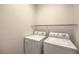 Laundry room with a standard washer and dryer at 3520 Kittiwake Rd, North Las Vegas, NV 89084