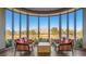 Inviting sitting area with comfortable chairs and a picturesque view at 3520 Kittiwake Rd, North Las Vegas, NV 89084