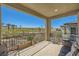 Relax on this covered balcony and enjoy views of the golf course and distant mountains at 39 Strada Fontana, Henderson, NV 89011