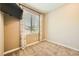 Spare bedroom with a large window, neutral color palette, and modern style at 39 Strada Fontana, Henderson, NV 89011