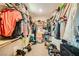 Walk-in closet with ample shelving, hanging space, and shoe storage, perfect for organizing your wardrobe at 39 Strada Fontana, Henderson, NV 89011