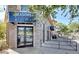 Exterior view of the Seasons Grocery store featuring a stone facade and inviting entrance at 39 Strada Fontana, Henderson, NV 89011