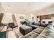Spacious living room with a comfortable couch, modern décor, and an open floor plan at 39 Strada Fontana, Henderson, NV 89011
