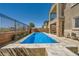 Rectangular pool with a view of the outdoor living space at 39 Strada Fontana, Henderson, NV 89011