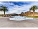 Inviting outdoor pool with palm trees and mountain views perfect for relaxing and enjoying the scenery at 39 Strada Fontana, Henderson, NV 89011