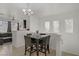 Bright dining area with modern decor, tile floor, and neutral color palette at 3915 Palm Beach St # 201, Las Vegas, NV 89129