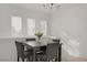Bright dining area with modern decor, tile floor, and neutral color palette at 3915 Palm Beach St # 201, Las Vegas, NV 89129