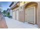 Condo entrance featuring an arched doorway and security door at 3915 Palm Beach St # 201, Las Vegas, NV 89129