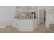 Functional kitchen area featuring a breakfast bar, modern appliances, and ample counter space at 3915 Palm Beach St # 201, Las Vegas, NV 89129