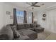 Comfortable living room featuring a plush sectional sofa and plenty of natural light at 3915 Palm Beach St # 201, Las Vegas, NV 89129