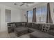 Inviting living room with a large sectional sofa, perfect for relaxation and entertaining at 3915 Palm Beach St # 201, Las Vegas, NV 89129