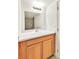Bathroom featuring a wooden vanity with quartz countertop at 4131 Gannet Cir # 389, Las Vegas, NV 89103