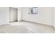Bright bedroom boasts tile flooring and a closet with sliding doors and hanging rack at 4131 Gannet Cir # 389, Las Vegas, NV 89103