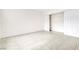 Bright bedroom features a closet with sliding doors and light tile flooring at 4131 Gannet Cir # 389, Las Vegas, NV 89103