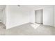 This bright bedroom features tile flooring and a closet with sliding doors at 4131 Gannet Cir # 389, Las Vegas, NV 89103
