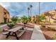 Beautifully landscaped community features walkways, trees, and picnic areas for residents at 4131 Gannet Cir # 389, Las Vegas, NV 89103