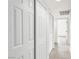 Hallway with white doors and tile flooring at 4131 Gannet Cir # 389, Las Vegas, NV 89103