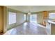Open-concept kitchen features natural light, tile floors, and backyard access at 4921 Lazy Day Ct, Las Vegas, NV 89131