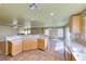 Spacious kitchen features a breakfast bar and opens to backyard access at 4921 Lazy Day Ct, Las Vegas, NV 89131