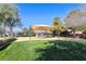 A playground with a sunshade provides a fun outdoor space for children to play and enjoy the day at 4921 Lazy Day Ct, Las Vegas, NV 89131