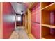 Walk-in closet with adjustable wooden shelves and ample storage space at 4921 Lazy Day Ct, Las Vegas, NV 89131