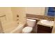 Bathroom with a granite countertop, modern sink, and a combined tub and shower at 5158 S Jones Blvd # 107, Las Vegas, NV 89118