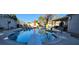 Backyard oasis with a large pool, diving board, and lounging areas, perfect for summer fun at 5318 Palmyra Ave, Las Vegas, NV 89146