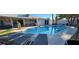Backyard with a private pool with lounge chairs, and jacuzzi, perfect for relaxing and entertaining at 5318 Palmyra Ave, Las Vegas, NV 89146