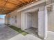 Backyard showing two entrances, a concrete patio with artificial turf, and a clear view of the inviting pool at 5364 Awbury Ave, Las Vegas, NV 89110