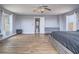 This main bedroom offers ample space and wood-style floors at 5364 Awbury Ave, Las Vegas, NV 89110