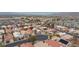 Spacious suburban neighborhood showcases the rooftops of numerous single-Gathering homes in a Primary-planned community at 6133 Alderley Ct, North Las Vegas, NV 89081
