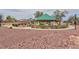 Community playground with vibrant play structures and shaded seating areas at 6133 Alderley Ct, North Las Vegas, NV 89081