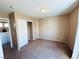Bedroom featuring neutral walls, carpet, and a closet for ample storage, with adjacent bathroom at 6297 Peach Orchard Rd, Las Vegas, NV 89142