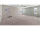 This large bedroom offers natural light and a ceiling fan at 6403 Dundock Ave, Las Vegas, NV 89122