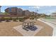 Outdoor picnic area features tables with seating, set amid landscaped grounds, ideal for gatherings and relaxation at 6403 Dundock Ave, Las Vegas, NV 89122
