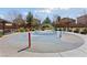 Community splash pad offers a colorful and fun water play area for children to enjoy on warm days at 6403 Dundock Ave, Las Vegas, NV 89122