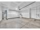 Spacious two car garage with water heater and concrete flooring at 6952 Crimson Shadow St, North Las Vegas, NV 89086