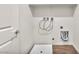 Dedicated laundry room with modern hookups and flooring at 6952 Crimson Shadow St, North Las Vegas, NV 89086