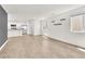 Spacious open-concept living room with modern flooring and ample natural light at 6952 Crimson Shadow St, North Las Vegas, NV 89086