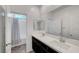This bathroom features dual sinks, modern fixtures, and a tub/shower combo at 7204 N Decatur Blvd, North Las Vegas, NV 89131