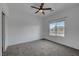 Well-lit bedroom features a ceiling fan and a large window at 7204 N Decatur Blvd, North Las Vegas, NV 89131