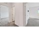 Upstairs hallway with doors leading to bedrooms at 7204 N Decatur Blvd, North Las Vegas, NV 89131