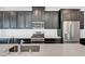Stylish kitchen featuring stainless appliances, a gas cooktop, and white countertops at 7204 N Decatur Blvd, North Las Vegas, NV 89131