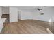 Spacious living room with wood flooring and staircase access to upper level at 7204 N Decatur Blvd, North Las Vegas, NV 89131
