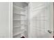 Walk-in pantry with ample shelving for food storage at 7204 N Decatur Blvd, North Las Vegas, NV 89131